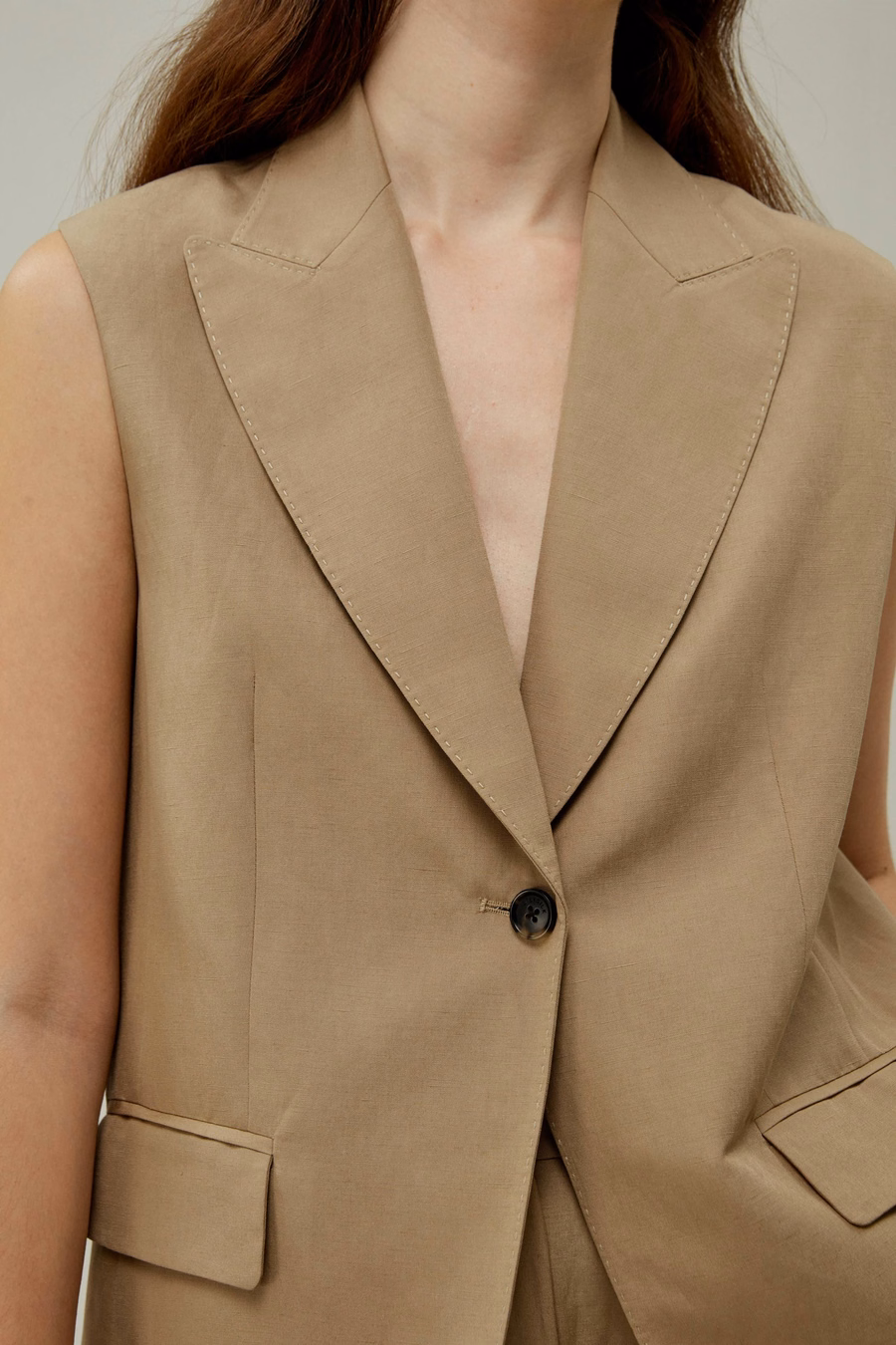 Blazer sans manches à bouton unique