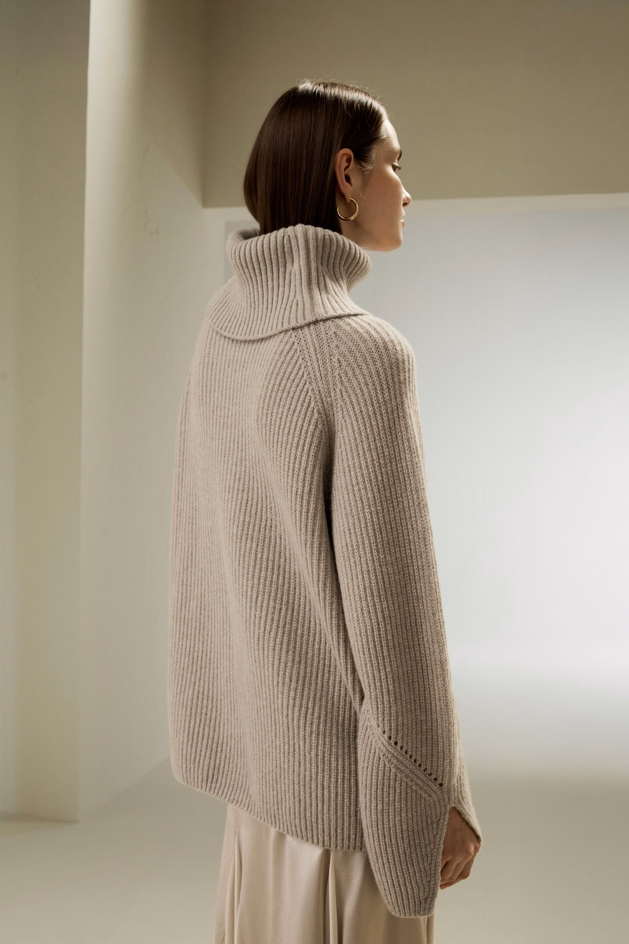 Pull surdimensionné en laine mérinos avec manches fendues