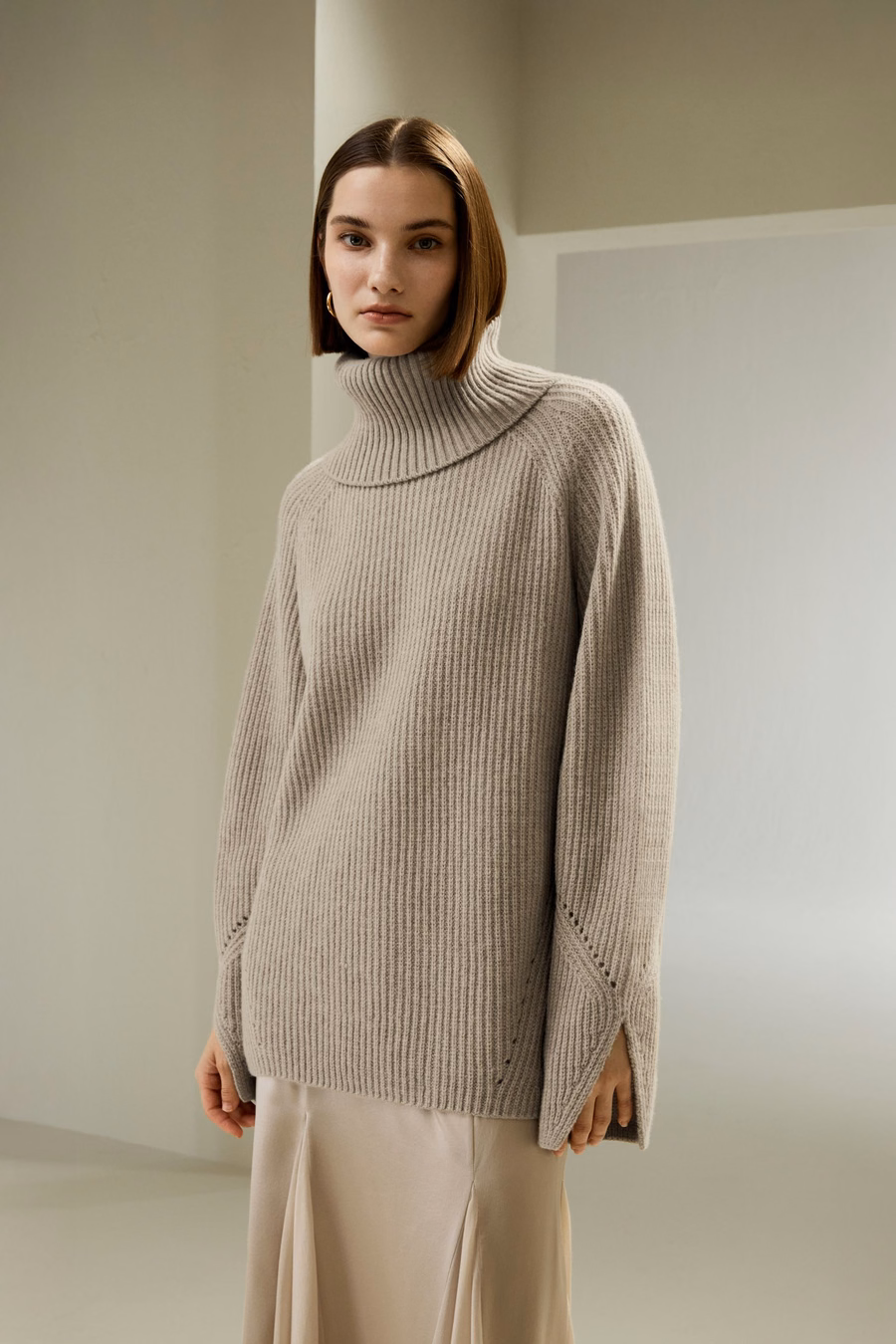 Pull surdimensionné en laine mérinos avec manches fendues