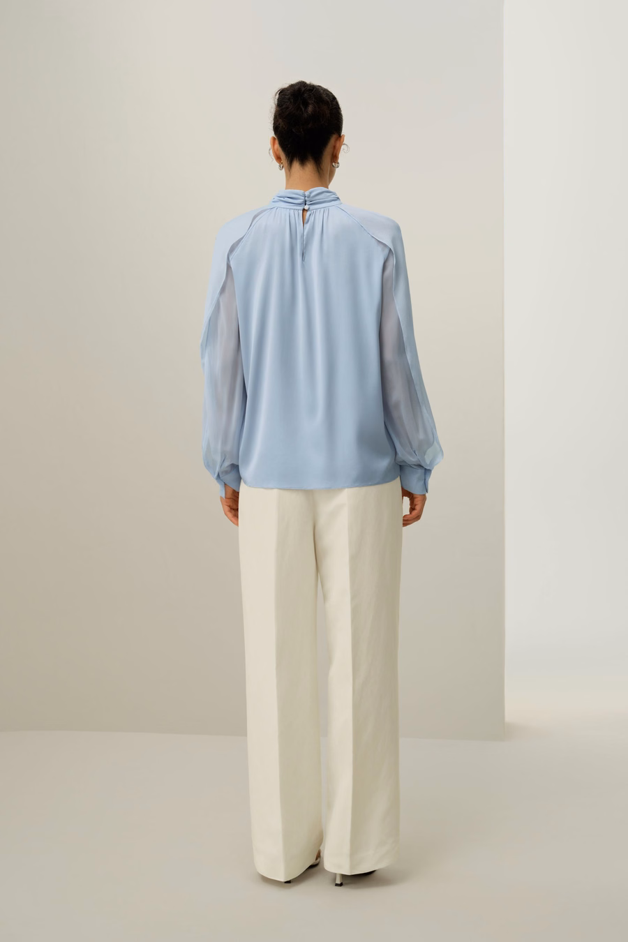 Blouse à manches lanternes et fente sur le côté