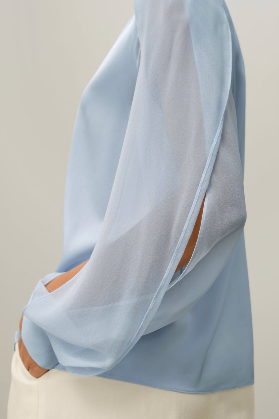 Blouse à manches lanternes et fente sur le côté