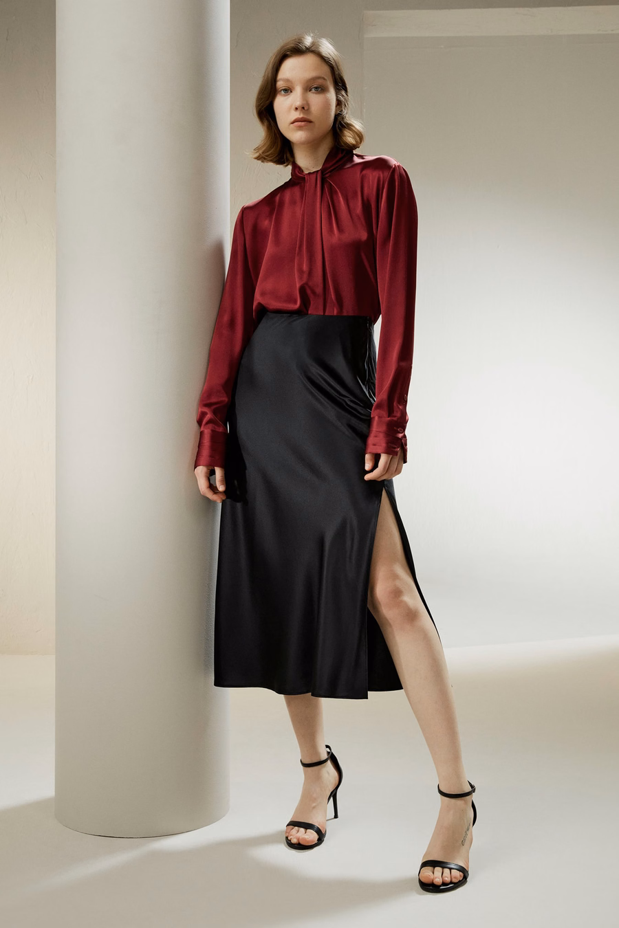 Chemise à plis embellis asymétriques