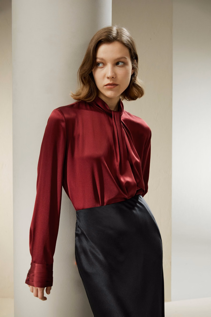 Chemise à plis embellis asymétriques