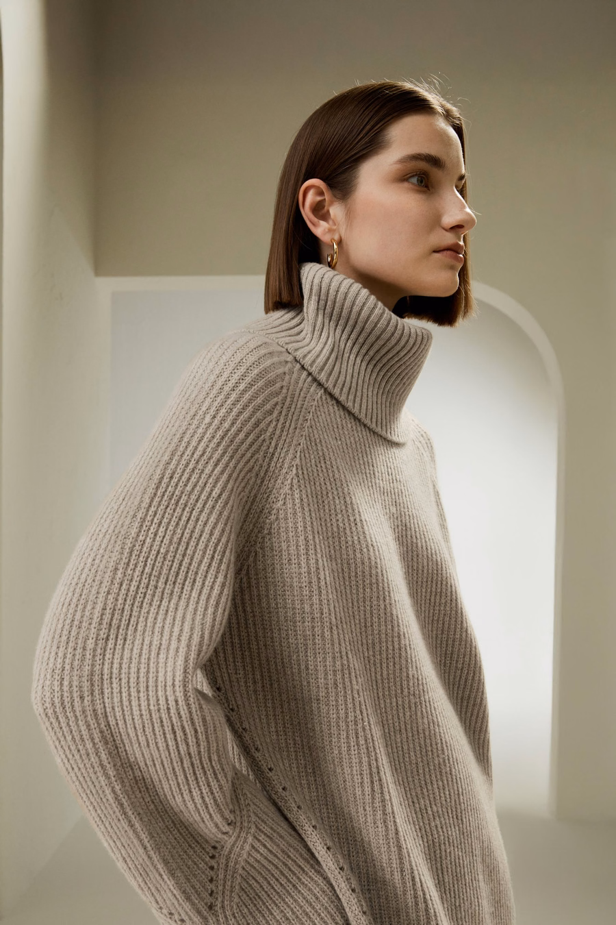 Pull surdimensionné en laine mérinos avec manches fendues